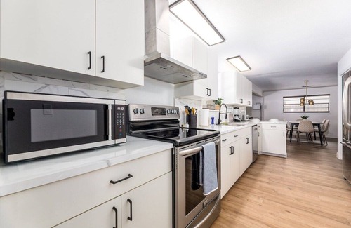 Interchange Square House | Bay Bungalow: Heated Pool & Game Room with Ocean Views