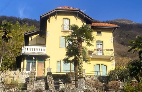 Perledo Villa | Cozy Villa Room with Terrace and Serene Garden Views
