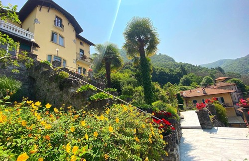 Perledo Villa | Cozy Villa Room with Terrace and Serene Garden Views
