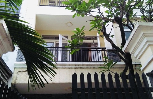 Phu My House | Serene Private Room with Inviting Green View