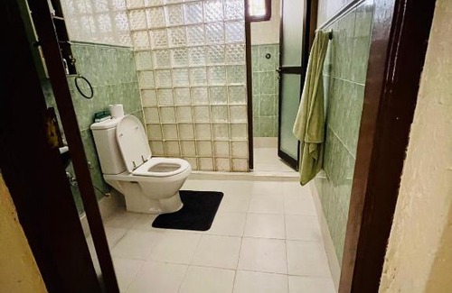Chukwani House | Cozy Private Room with Serene Garden Retreat