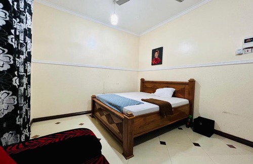Chukwani House | Cozy Private Room with Serene Garden Retreat
