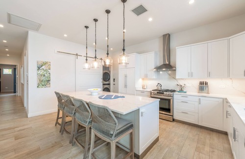 West Bay Condo | Exclusive Seven Mile Beach Club with Rooftop and Pool