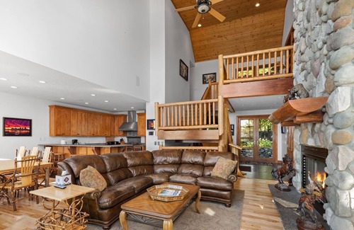 Kewadin House | Secluded Torch Lake Home with Pool and Spa Amenities