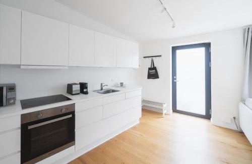 Øgadekvarteret Apartment | Private Townhouse with Terrace: Family-Friendly Retreat