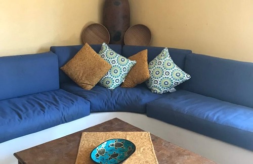 Queretaro Condo | Relax in a Tropical Oasis Steps from Beach and Dining