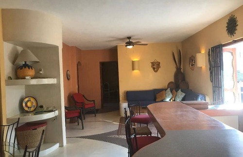 Queretaro Condo | Relax in a Tropical Oasis Steps from Beach and Dining