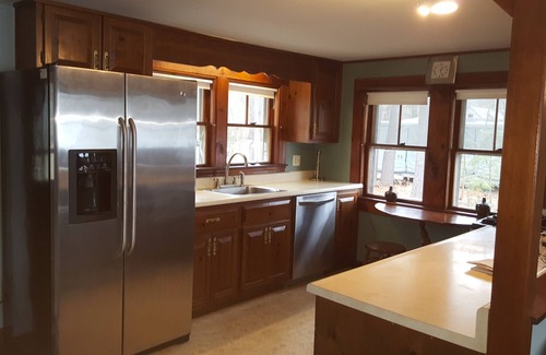 Hampstead Cottage | Scenic Water Front Home on Sunset Lake with Private Beach