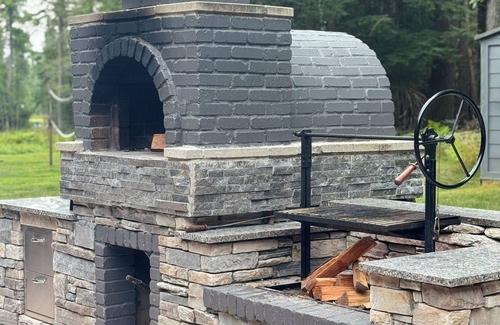 Bellaire Cottage | Book Summer 2025: Private Dock, Hot Tub & Pizza Oven!