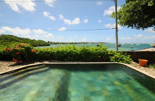 Trou d'Eau Douce Villa | Idyllic Waterfront Villa with Pool & Ocean Views