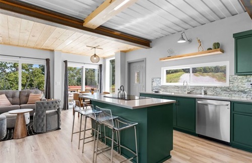 Omaha House | Relax at Lake View Roof Deck with Hot Tub and Breakfast