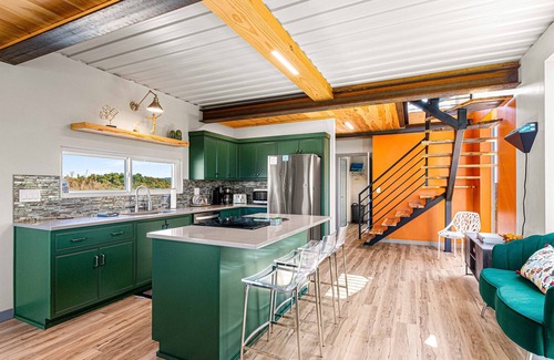 Omaha House | Relax at Lake View Roof Deck with Hot Tub and Breakfast