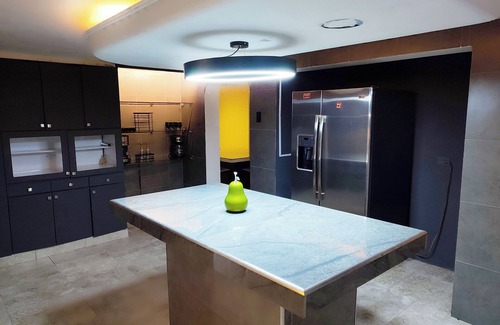 Zona Rosa Apartment | Icon Suites: Family-Friendly Retreat with Pool & Spa