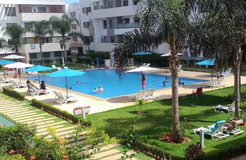 Pont Blondin Apartment | Elegant El Mansouria Residence with Pool & Beach Access