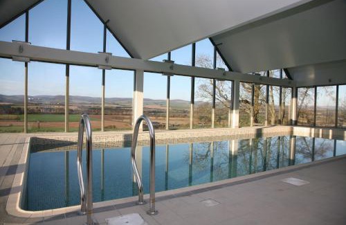 Forfar House | Discover Tranquility at Prosen with Poolside Relaxation
