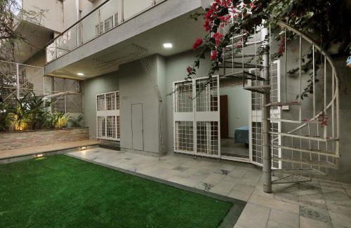 Bengaluru Other | Prutha's Nest Room 1 - opening to vibrant garden