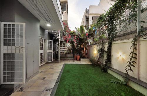 Bengaluru Other | Prutha's Nest Room 1 - opening to vibrant garden