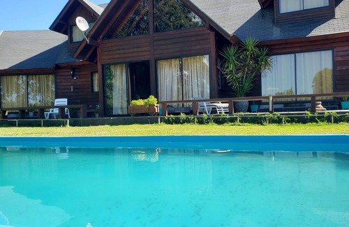 Molco Ski Chalet | Experience Los Arrayanes Chalet: Poolside Retreat in Pucon