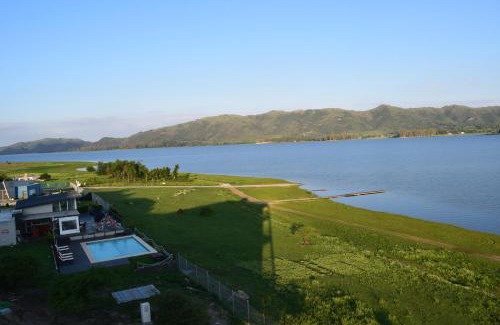 Alta Gracia Apartment | Beautiful Puerto del Águila Departamentos with Lake Views