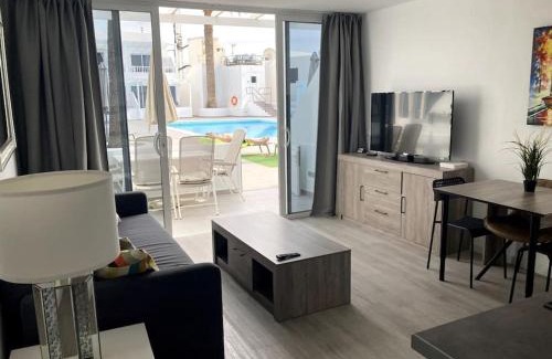 Los Mojones Apartment | Cozy Poolside Apartment in Puerto Del Carmen with Ocean View