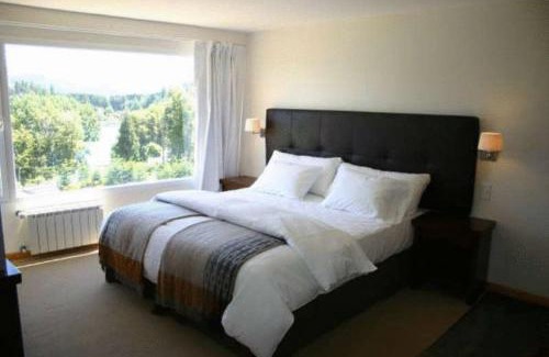 Villa La Angostura Hotel | Oceanfront Puerto Manzano Suites with Hot Tub Access