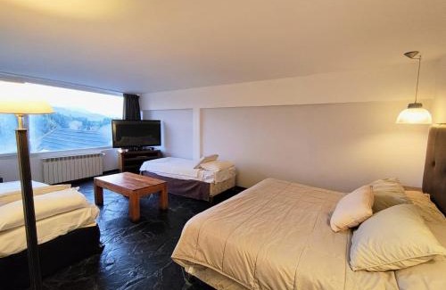 Villa La Angostura Hotel | Oceanfront Puerto Manzano Suites with Hot Tub Access