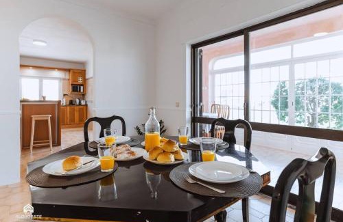 Praia de Santa Cruz House | Family-Friendly Puerto Raval: 5 Bedrooms with BBQ & Garden