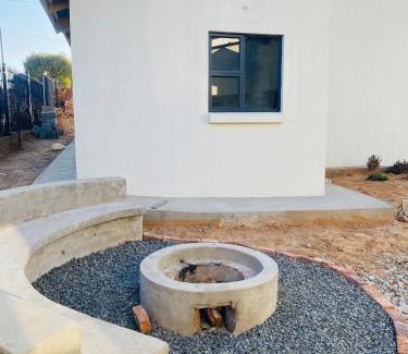 Lesotho Apartment | Experience Pule's Home: Guest Rated 9.3 with Pet-Friendly Perks