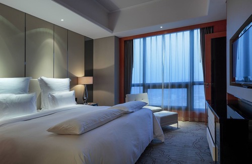 Lishan District Hotel | Relax at Pullman Anshan Time Square: 4-Star Comfort Awaits