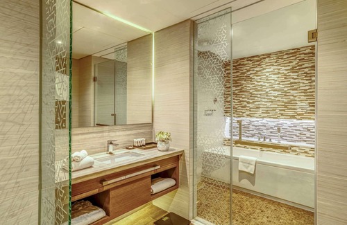 Al Khan Hotel | Experience Pullman Sharjah: 5-Star Stay with Pool & Spa