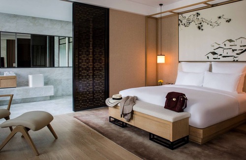 Kunshan Hotel | Enjoy Poolside Relaxation at Pullman Zhouzhuang Hotel