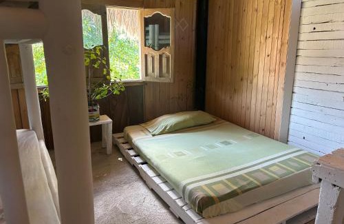 Tierra Bomba Island House | Pet-Friendly Punta Arena EcoHostal: Family Comfort Awaits