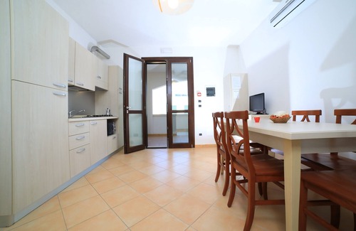 Porto Cesareo Apartment | Punta Grossa Village: Family-Friendly Stay with Pool & Spa