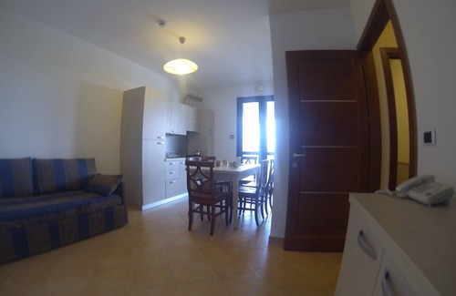 Porto Cesareo Apartment | Punta Grossa Village: Family-Friendly Stay with Pool & Spa
