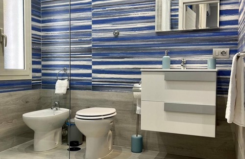Fuorigrotta House | Eco-Friendly Punto House: Top Rated & Family Friendly Stay