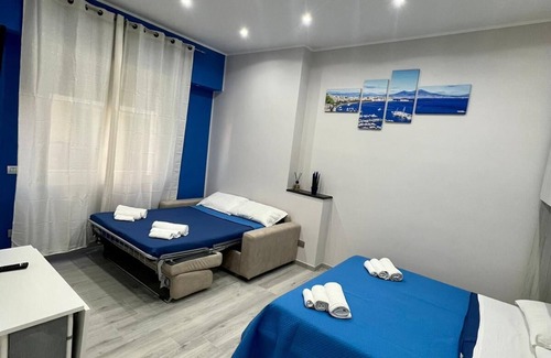 Fuorigrotta House | Eco-Friendly Punto House: Top Rated & Family Friendly Stay