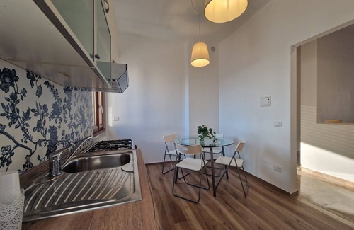 Novoli - San Donato Apartment | Experience PunziPaHouse Vittorio's in Florence with a Balcony