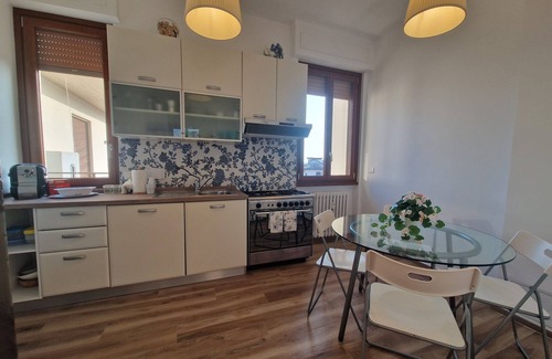 Novoli - San Donato Apartment | Experience PunziPaHouse Vittorio's in Florence with a Balcony