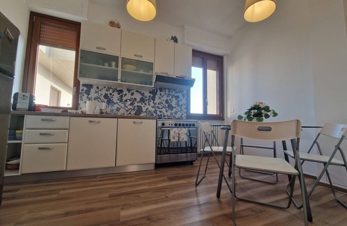 Novoli - San Donato Apartment | Experience PunziPaHouse Vittorio's in Florence with a Balcony
