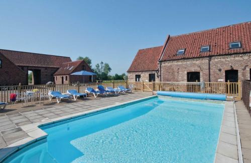 Runcton Holme House | Discover Purlin Barn - Family-Friendly Retreat with Pool