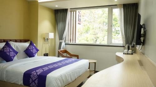 Surat Hotel | Discover Purple Beds by VITS - Family-Friendly in Surat
