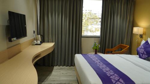 Surat Hotel | Discover Purple Beds by VITS - Family-Friendly in Surat