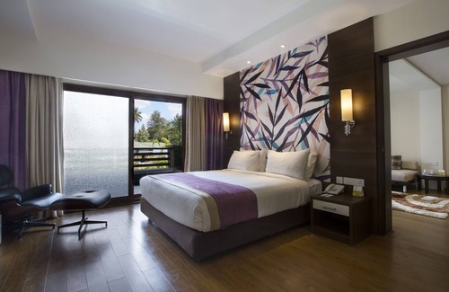 Kushalnagar Hotel | Relaxing Purple Palms Resort & Spa with Pool and Spa Access
