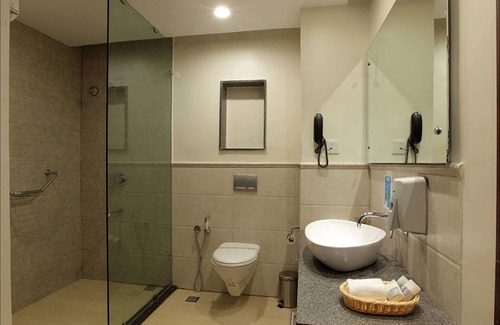 Kushalnagar Hotel | Relaxing Purple Palms Resort & Spa with Pool and Spa Access