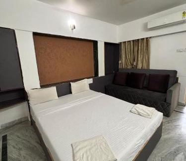 Shirdi Resort | Relax at Pushpak Resort: Oceanfront Poolside Retreat