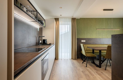 Brunico Apartment | Discover Pustrabase - Sambock Quarter with Family-Friendly Amenities