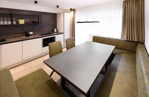 Brunico Apartment | Discover Pustrabase - Sambock Quarter with Family-Friendly Amenities