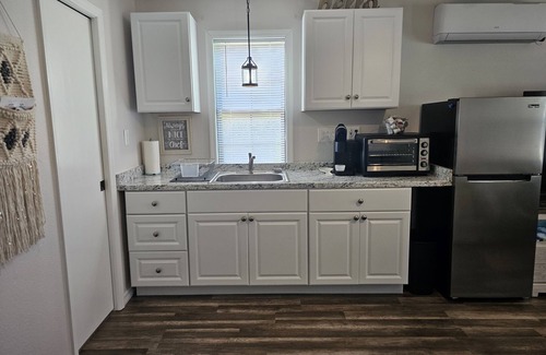 Spring Hill House | Elegant Suite with Private Heated Pool near Weeki Wachee