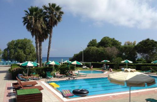 Petaloudes Hotel | Experience Pylea Beach Hotel: Oceanfront Bliss Awaits