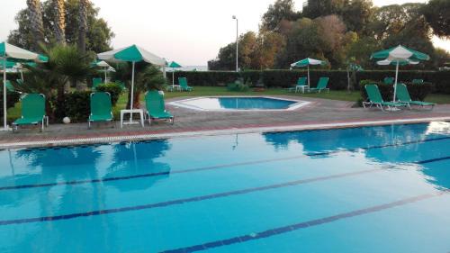 Petaloudes Hotel | Experience Pylea Beach Hotel: Oceanfront Bliss Awaits